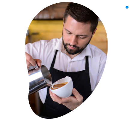 Barista Pouring milk