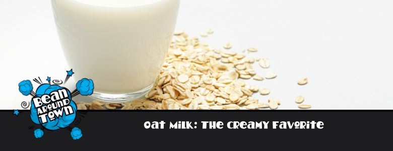 milk in a glass with oats surrounding