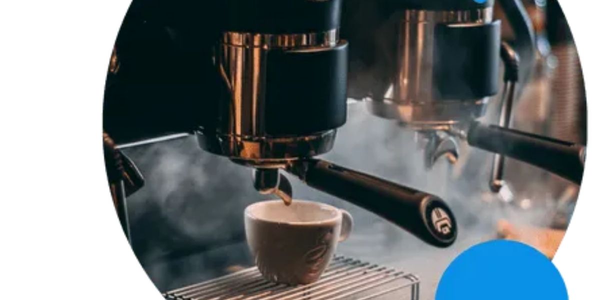 A coffee machine in use, brewing coffee, with tips for making the perfect cup of hot chocolate nearby.