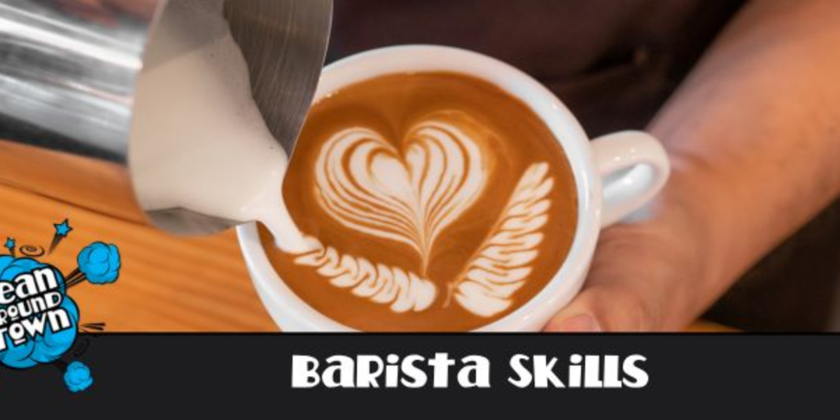 Barista demonstrating skills while preparing a chai latte with spices, milk, and froth in a cozy home setting.